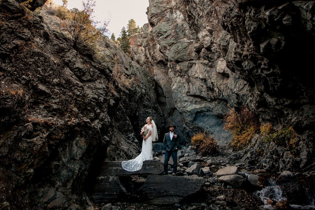 colorado elopement couple surrounded by dramatic cliffs