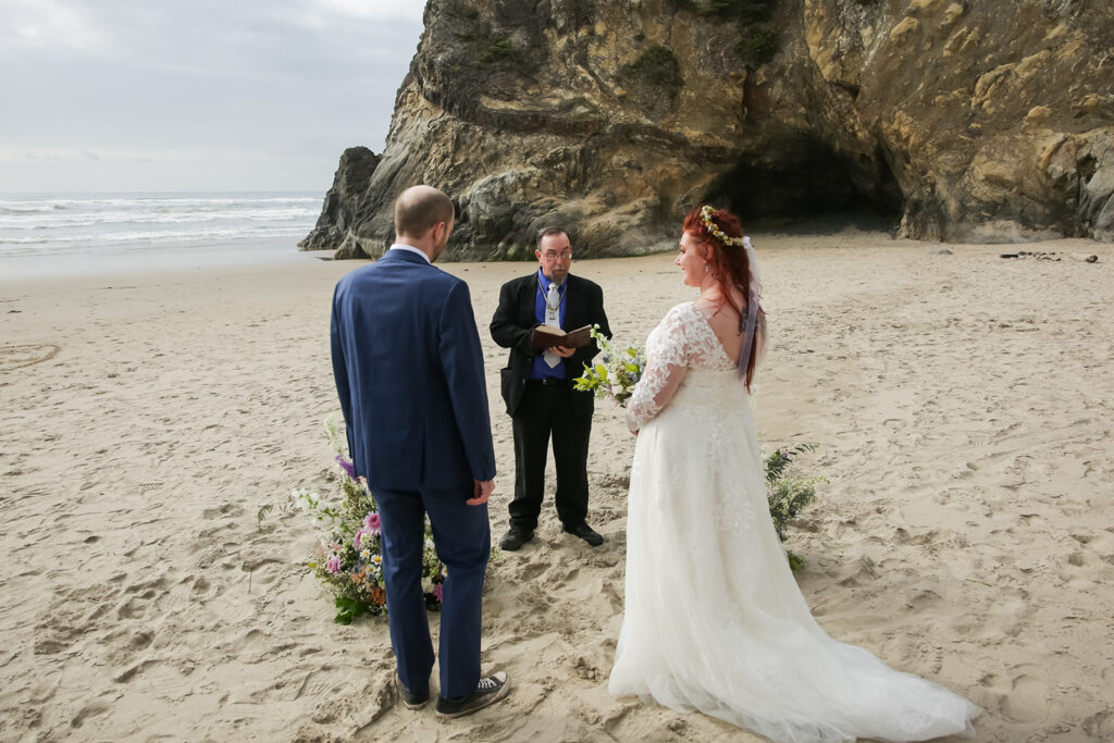 intimate hug point elopement ceremony