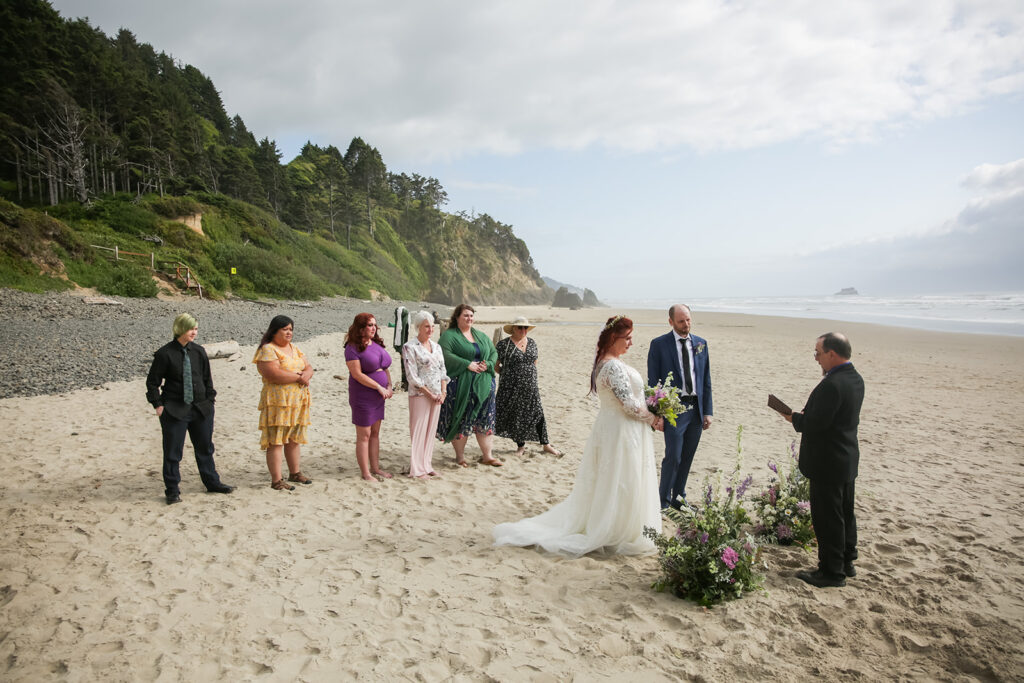 intimate hug point elopement ceremony